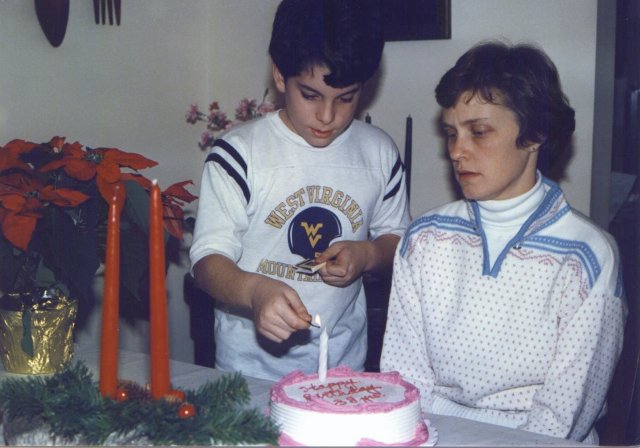 1986-12-17 Lighting a Candle on Mom's Cake.jpg