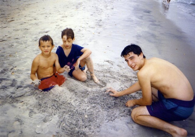 1992-08 Burying Tom in sand with Josh.jpg