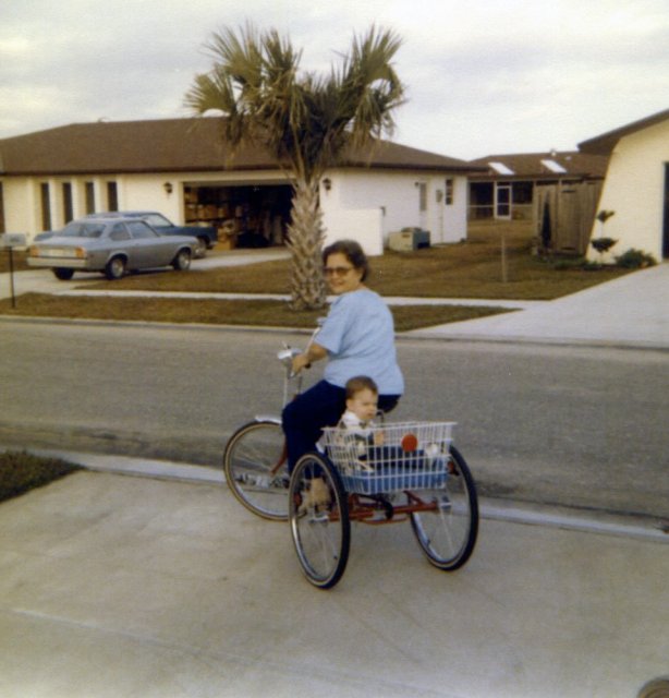 1978-03 1 Riding with G. Billy on her trike.jpg